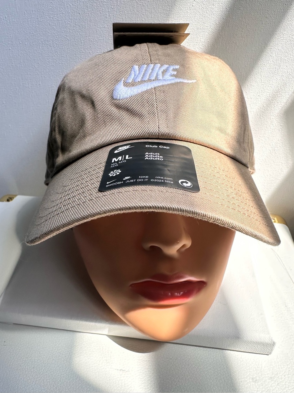 Nike club adult unstructured beige cap with White Swoosh